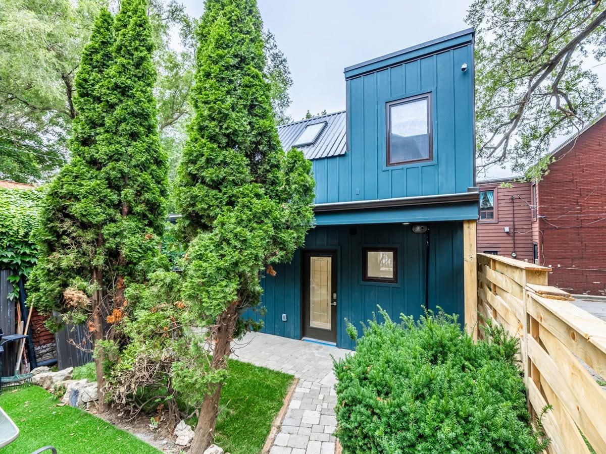 Completed modern laneway house with metal siding