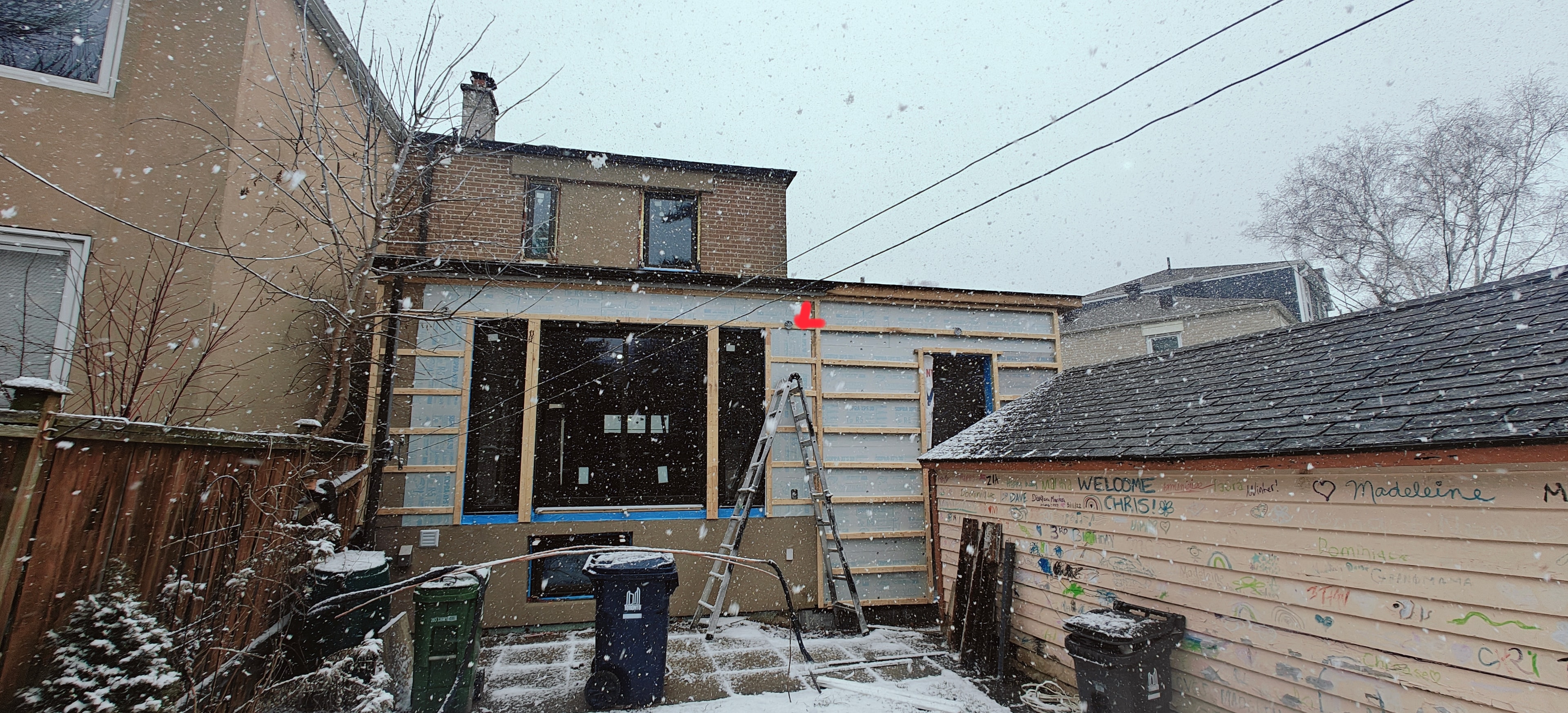 Rear addition renovation in snowstorm
