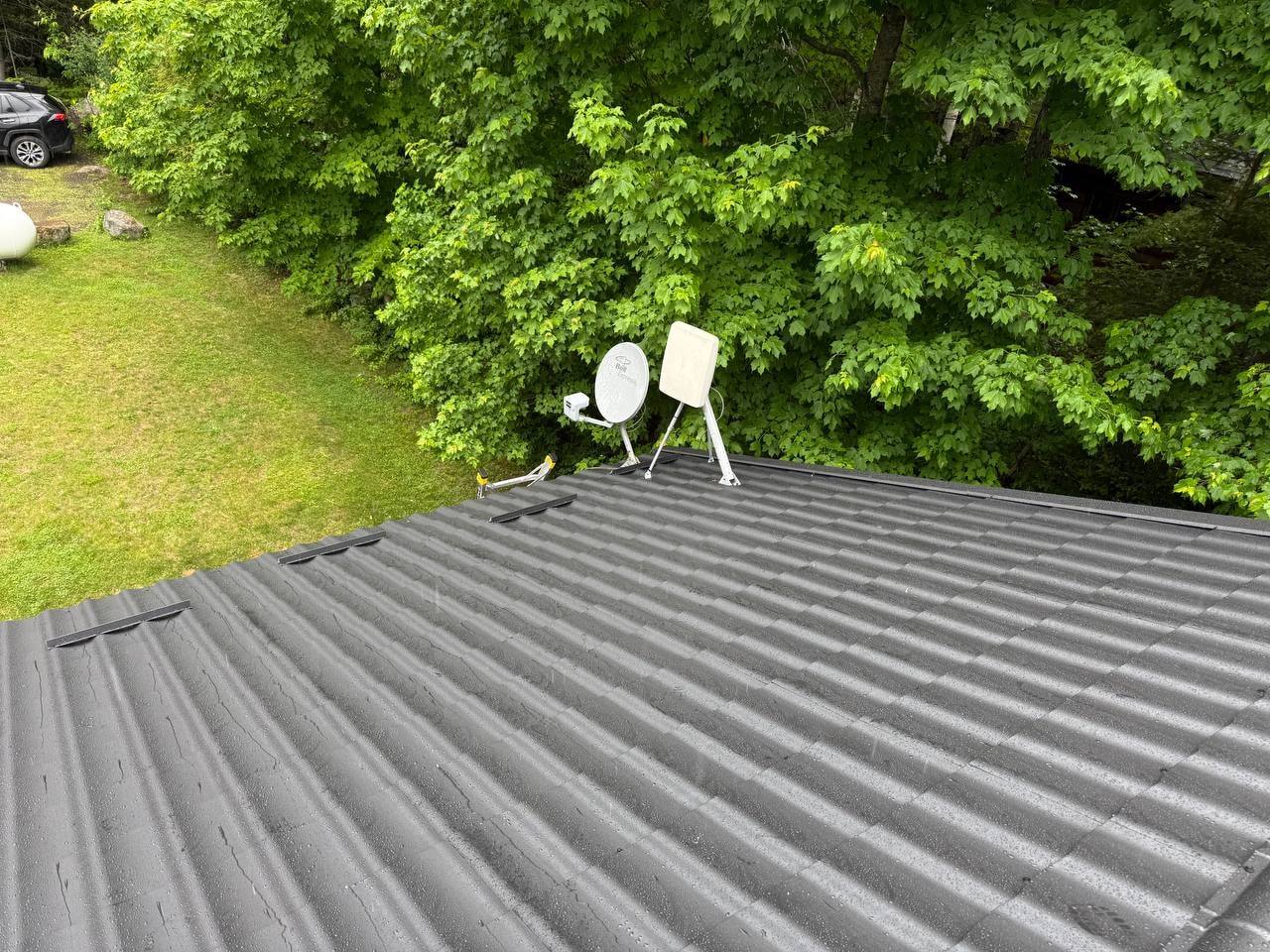 Completed metal roof with satellite dishes