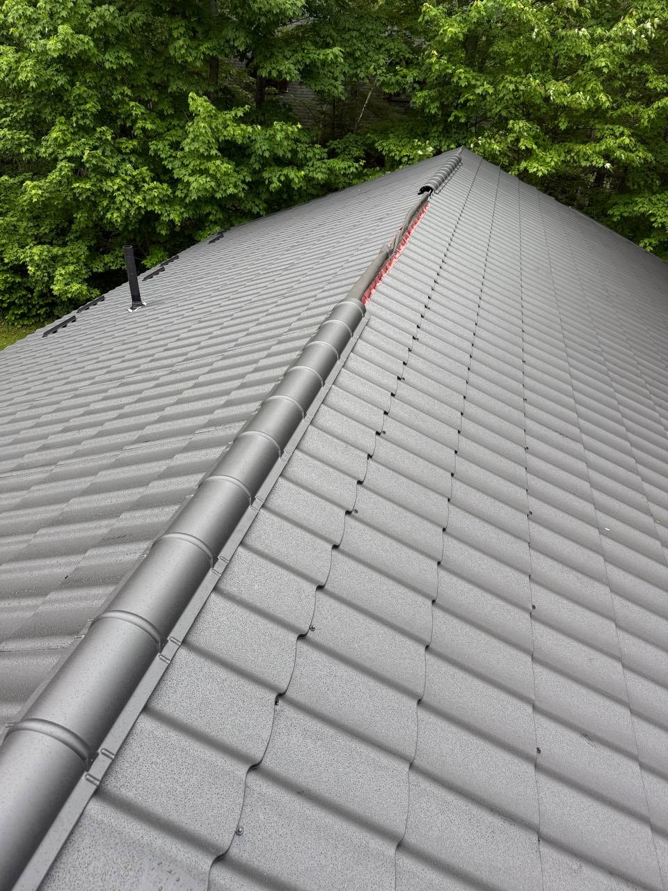 Metal roof ridge cap detail