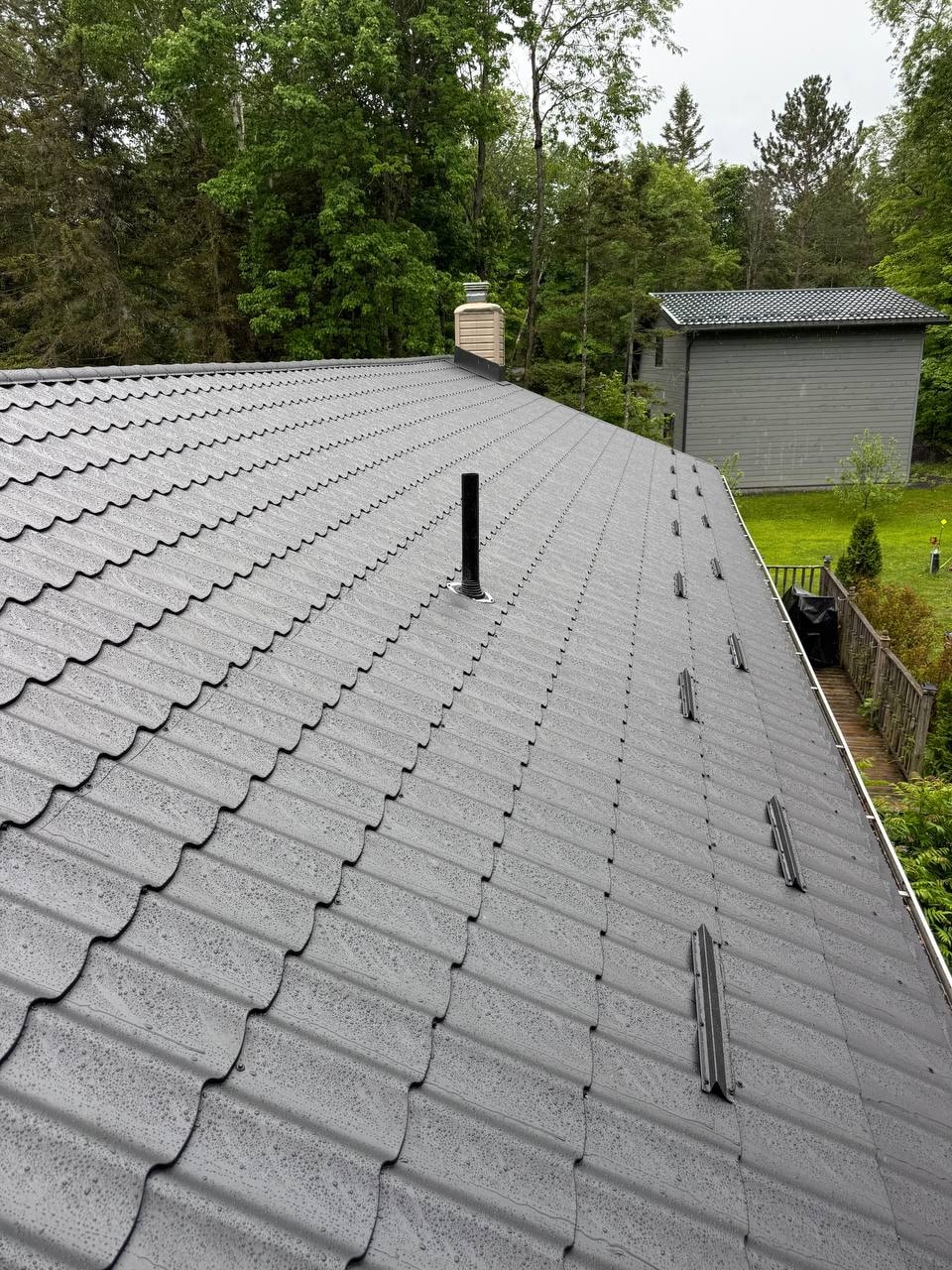 Completed metal roof with vent stack